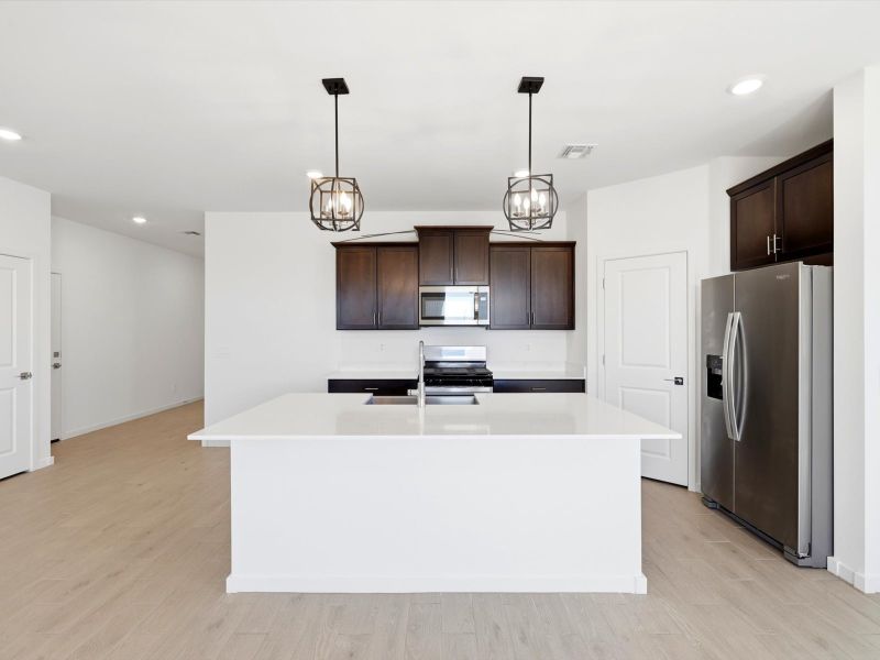 Furnished interior view inside a new home in Silva Farms - Classic Series, Goodyear (Image 5).