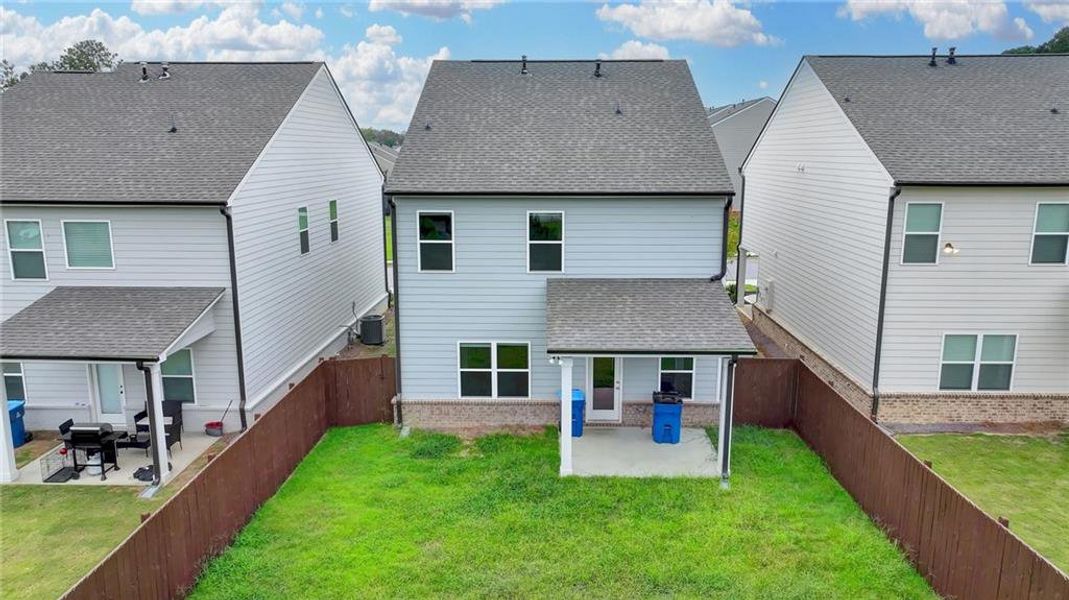 Exterior details and patio area of a home in Westgate Enclave, Loganville (Image 23).