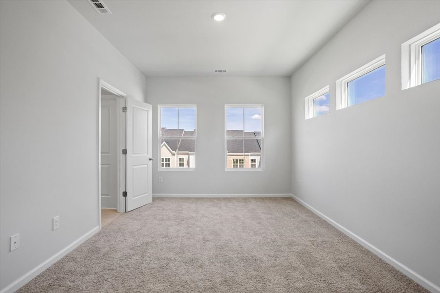 Spacious, unfurnished interior of a new home in Renaissance at White Oak, Garner (Image 17).