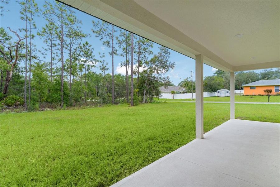 Exterior details and patio area of a home in , Citrus Springs (Image 24).