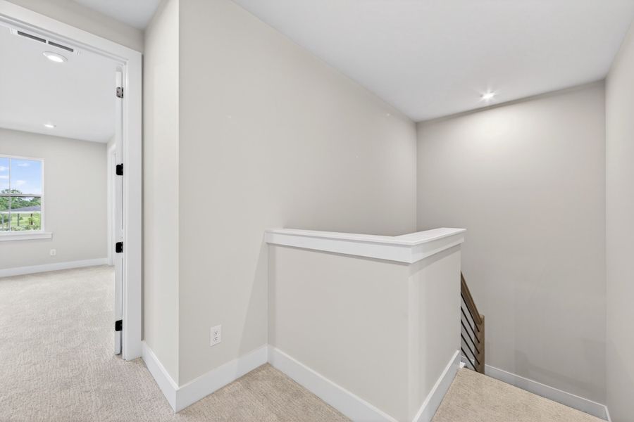 Spacious, unfurnished interior of a new home in Seven Oaks, Belmont (Image 29).