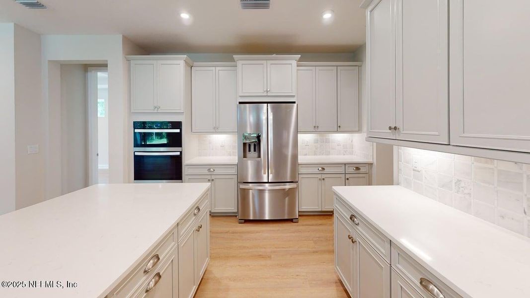 Furnished interior view inside a new home in RiverTown - WaterSong, St. Johns (Image 6).
