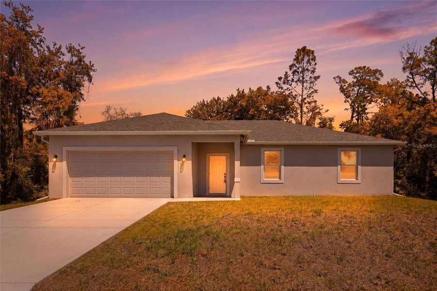 Front exterior of a new home in , Port Charlotte, FL, highlighting curb appeal (Image 21).
