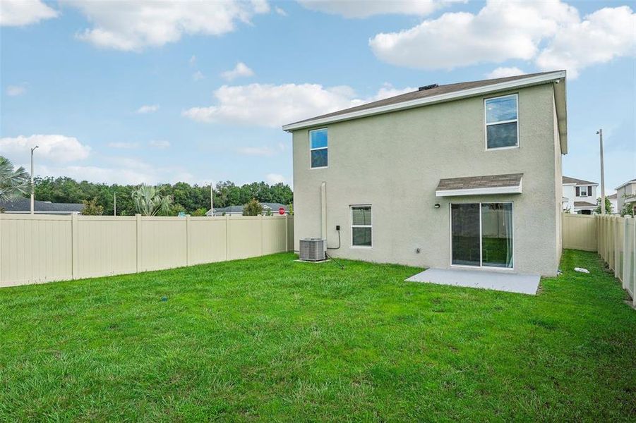 Exterior details and patio area of a home in Ridgewood, Riverview (Image 27).