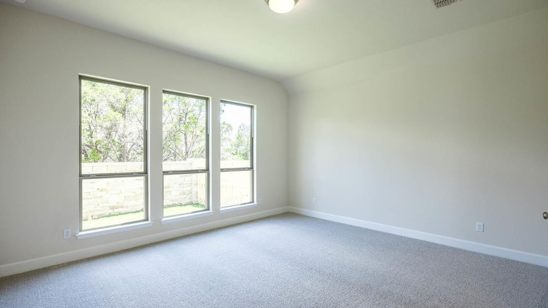 Unfurnished room featuring baseboards and carpet Unfurnished room featuring baseboards and carpet