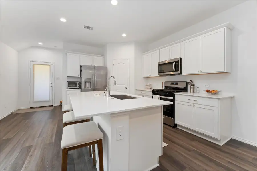 Furnished interior view inside a new home in Sunterra, Katy (Image 7). Furnished interior view inside a new home in Sunterra, Katy (Image 7).