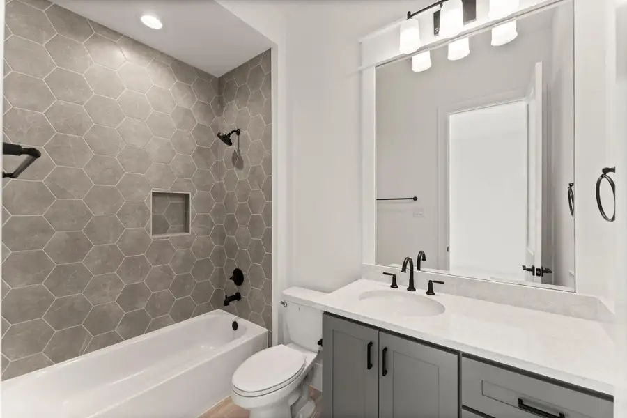 Furnished interior view inside a new home in Homestead Hill, New Waverly (Image 11).