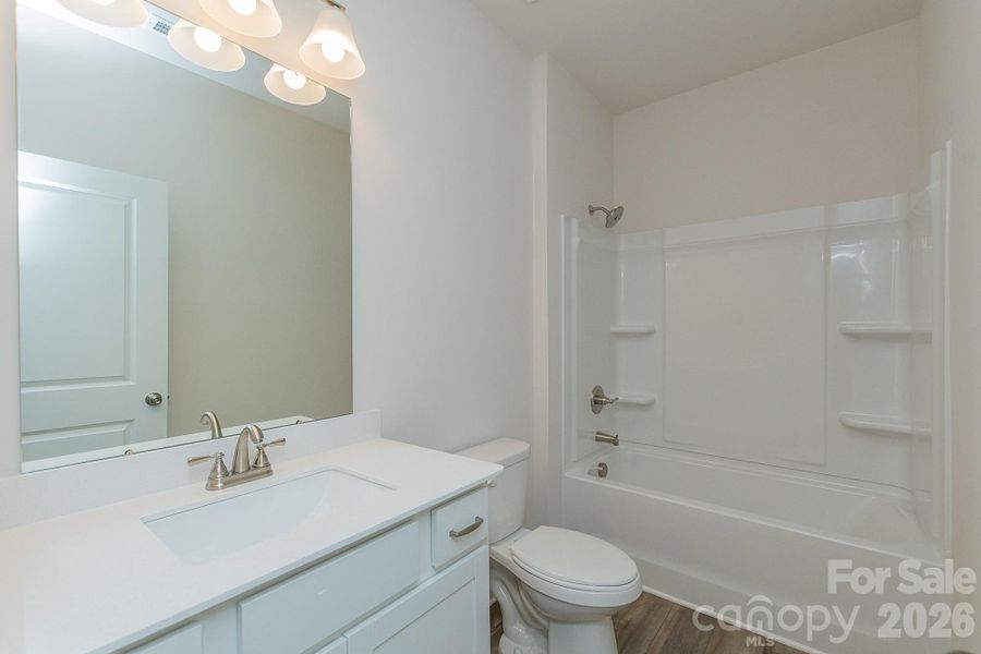 Furnished interior view inside a new home in Country Club Village, Salisbury (Image 8).