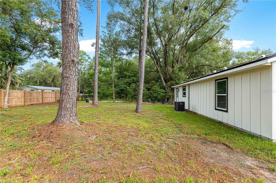 Exterior details and patio area of a home in , Fort McCoy (Image 16).