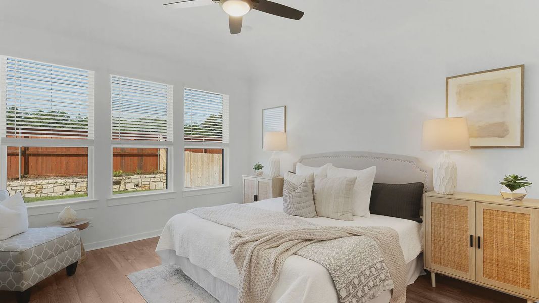 Representative furnished interior of a home built from the Brooks by Chesmar Homes in University Heights, Round Rock (Image 16).