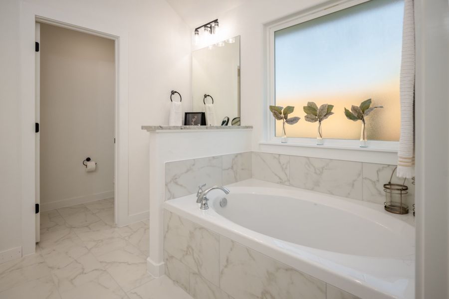 Representative furnished interior of a home built from the The Rose by Avonley Homes in Pinemont, Bryan (Image 18).