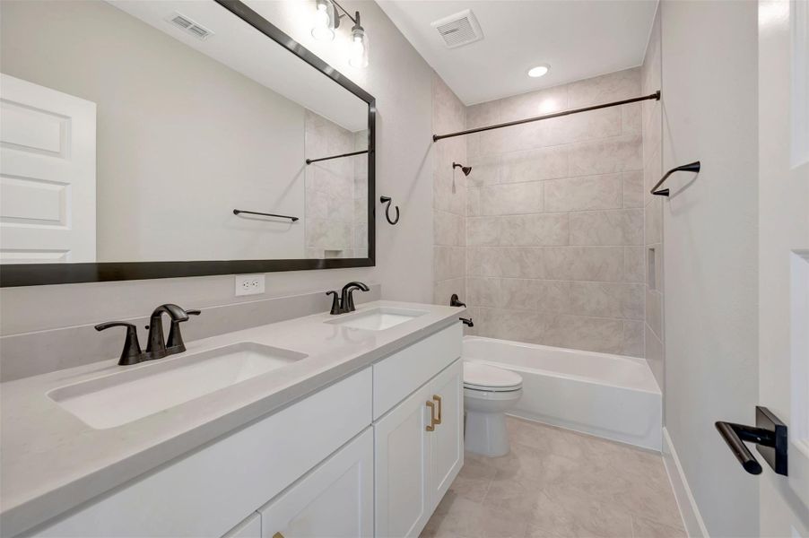 Furnished interior view inside a new home in Easthaven at Bridgeland Central - Vision Collection, Cypress (Image 10).