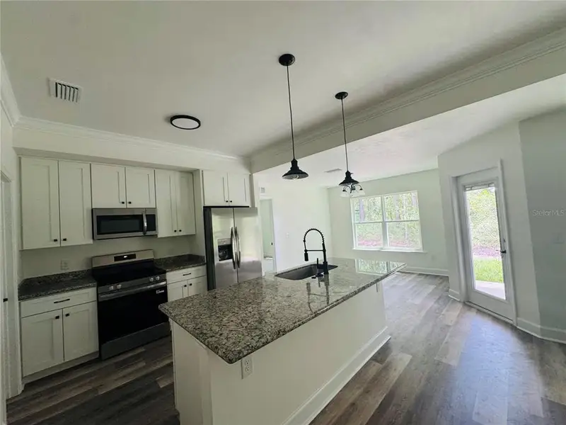 Furnished interior view inside a new home in , Bronson (Image 5).