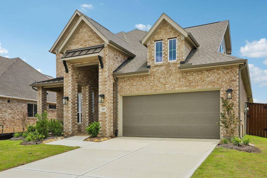 Front exterior of a new home in The Trails 50's, New Caney, TX, highlighting curb appeal (Image 17). Front exterior of a new home in The Trails 50's, New Caney, TX, highlighting curb appeal (Image 17).