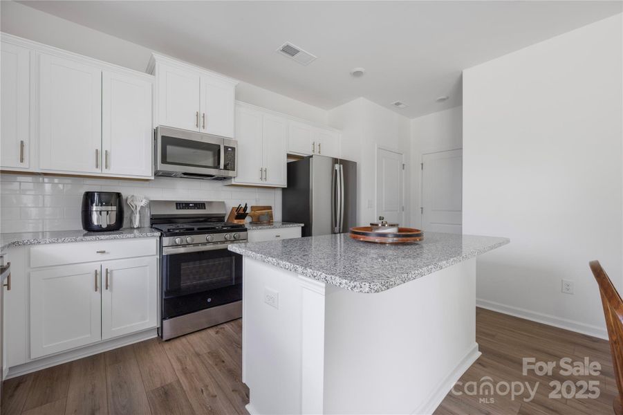 Furnished interior view inside a new home in Piper Landing, Concord (Image 5).
