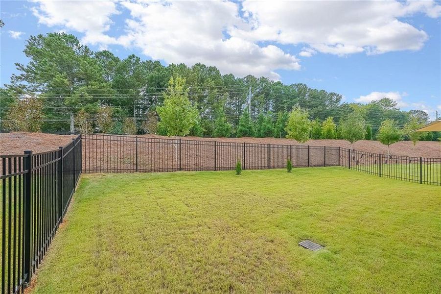 Exterior details and patio area of a home in The Reserve at Bells Ferry, Kennesaw (Image 4).