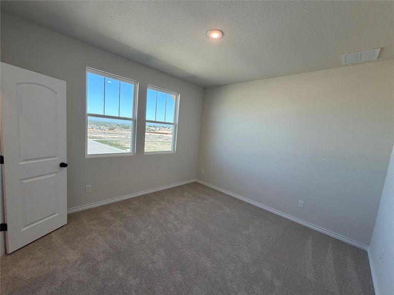 Spacious, unfurnished interior of a new home in Lariat, Liberty Hill (Image 31). Spacious, unfurnished interior of a new home in Lariat, Liberty Hill (Image 31).