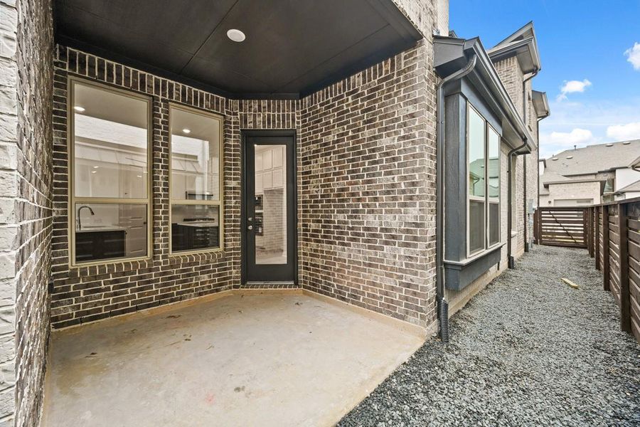 Exterior details and patio area of a home in Bridgeland, Cypress (Image 2). Exterior details and patio area of a home in Bridgeland, Cypress (Image 2).