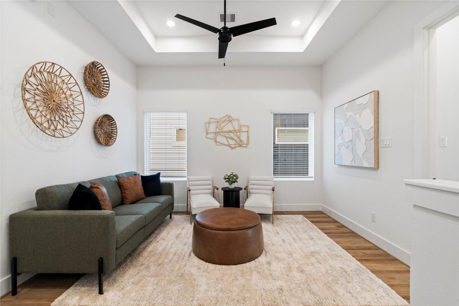 Bathed in natural light from oversized windows and elevated by elegant tray ceilings, the upstairs flex space feels open, airy, and inspiring — perfect as a secondary lounge, creative studio, or wellness retreat. Bathed in natural light from oversized windows and elevated by elegant tray ceilings, the upstairs flex space feels open, airy, and inspiring — perfect as a secondary lounge, creative studio, or wellness retreat.