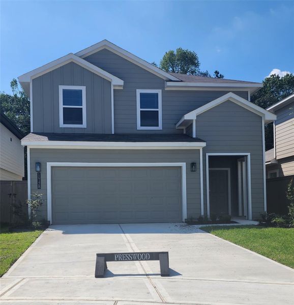 Front exterior of a new home in Presswoods, Splendora, TX, highlighting curb appeal (Image 19).