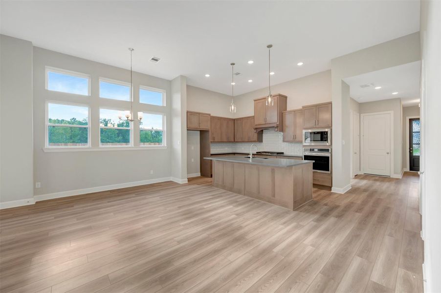 Furnished interior view inside a new home in COLTON - Reserve Collection, Todd Mission (Image 16).