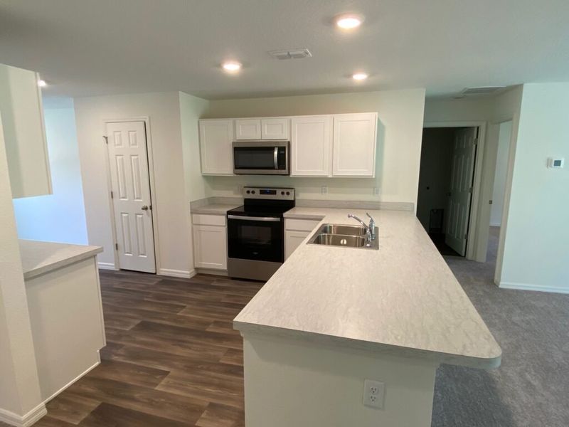 Representative furnished interior of a home built from the Foxtail by Holiday Builders in Ocala, Ocala (Image 4).