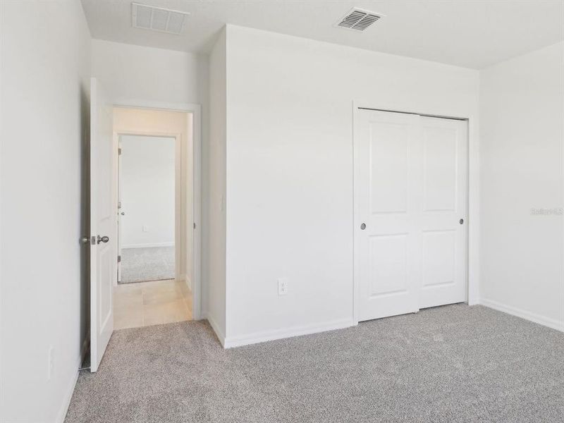 Spacious, unfurnished interior of a new home in The Reserve at Van Oaks, Auburndale (Image 27).