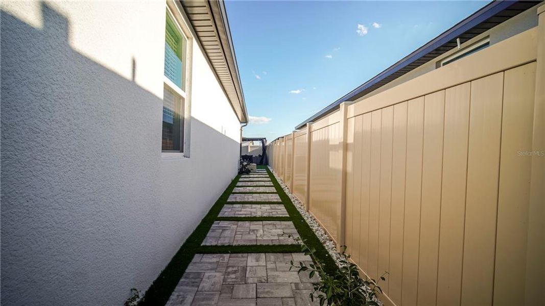 Exterior details and patio area of a home in , St. Cloud (Image 27).
