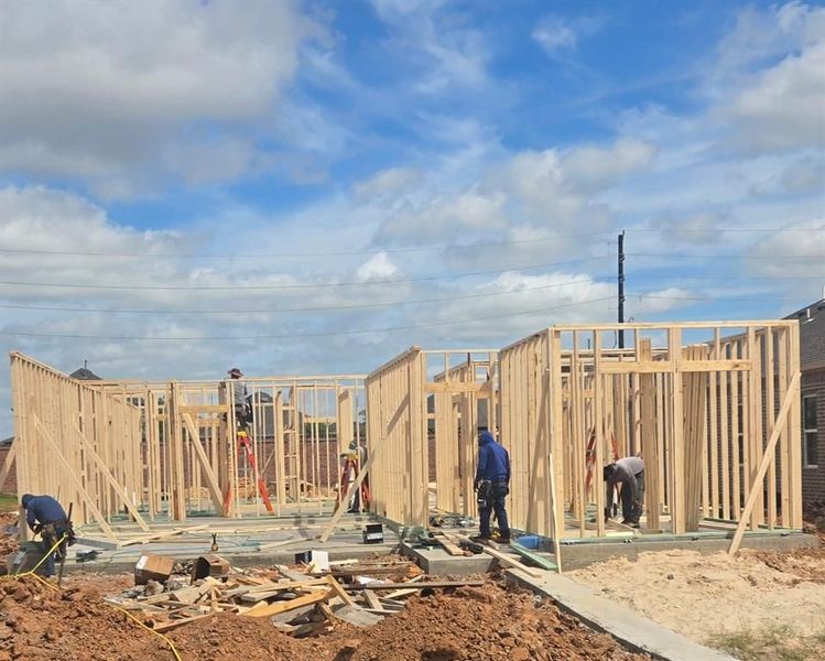 Front exterior of a new home in Sunterra, Katy, TX, highlighting curb appeal (Image 60). Front exterior of a new home in Sunterra, Katy, TX, highlighting curb appeal (Image 60).