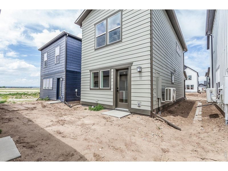 Exterior details and patio area of a home in Prairie Song Story Collection - Single Family Homes, Windsor (Image 23).
