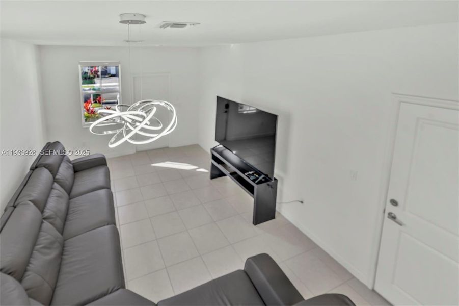 Furnished interior view inside a new home in , Coral Springs (Image 42).