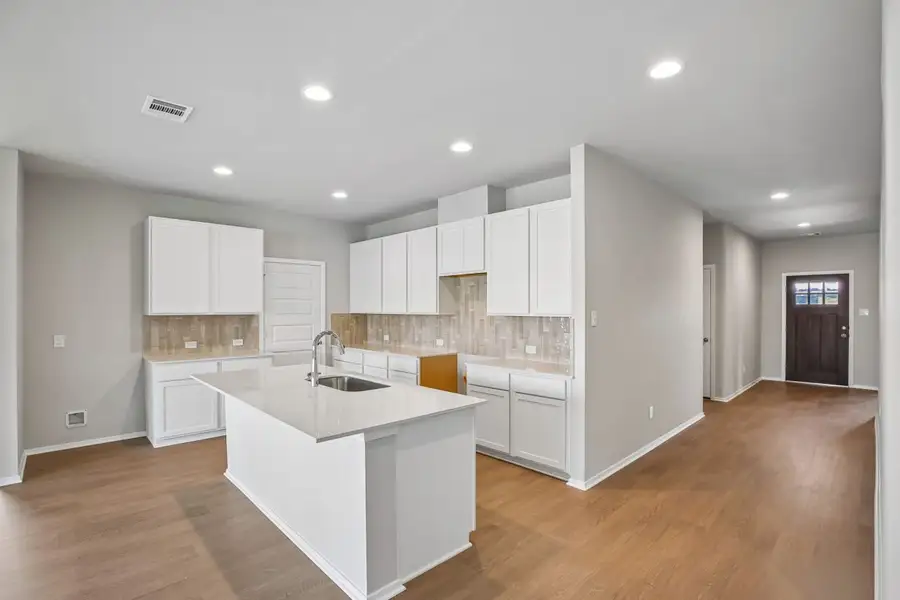 Furnished interior view inside a new home in Sorella, Tomball (Image 7).