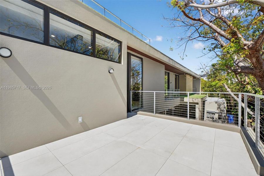 Exterior details and patio area of a home in , Miami (Image 38).
