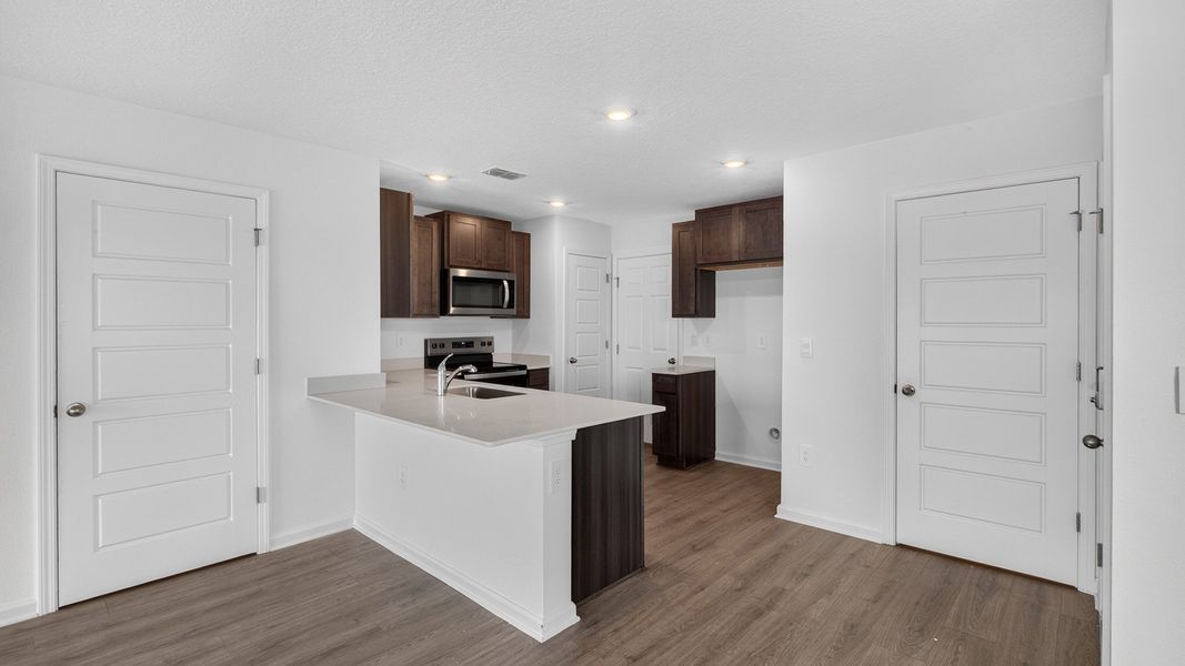Representative furnished interior of a home built from the Weston by D.R. Horton in Bridle Creek Townhomes, Jacksonville (Image 6).
