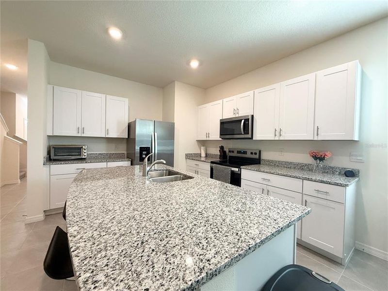 Furnished interior view inside a new home in , Kissimmee (Image 31).