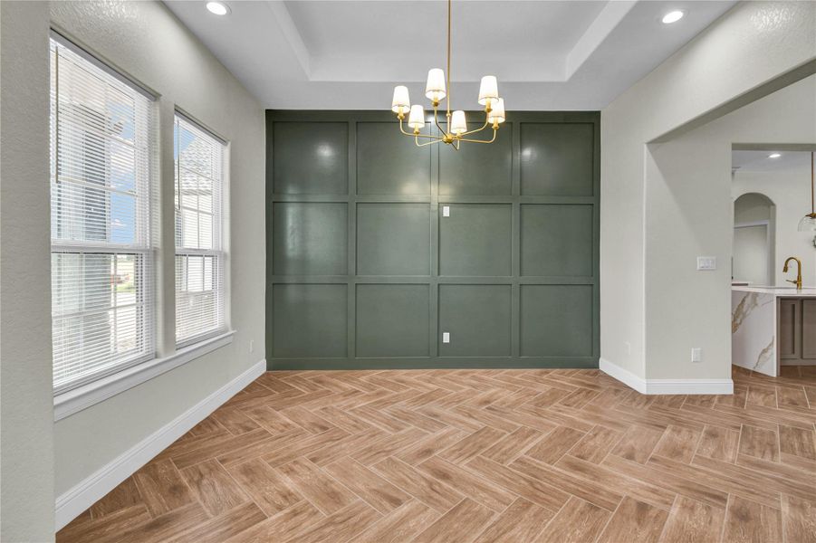 Dining room, herringbone pattern on tile floor Dining room, herringbone pattern on tile floor