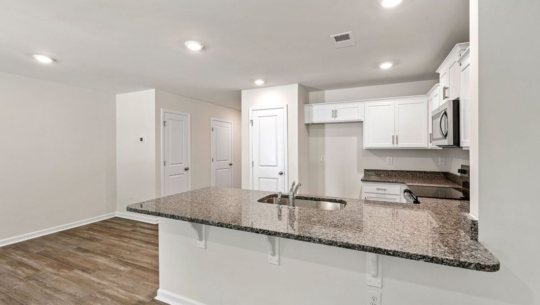 Furnished interior view inside a new home in Chestnut Ridge Townhomes, Greenville (Image 6).