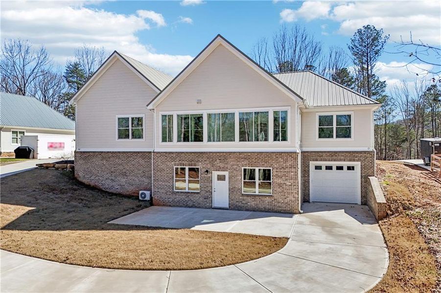 Front exterior of a new home in , Canton, GA, highlighting curb appeal (Image 32). Front exterior of a new home in , Canton, GA, highlighting curb appeal (Image 32).