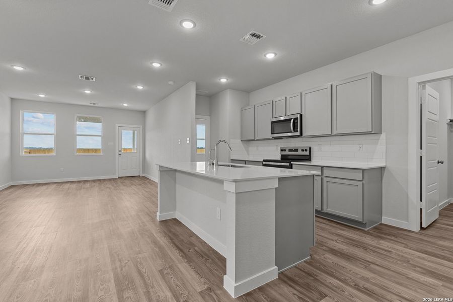 Furnished interior view inside a new home in Hacienda, San Antonio (Image 9).