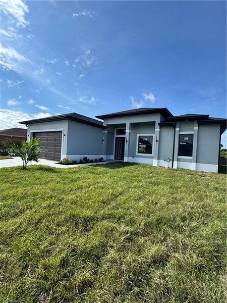 Exterior details and patio area of a home in , Lehigh Acres (Image 2). Exterior details and patio area of a home in , Lehigh Acres (Image 2).