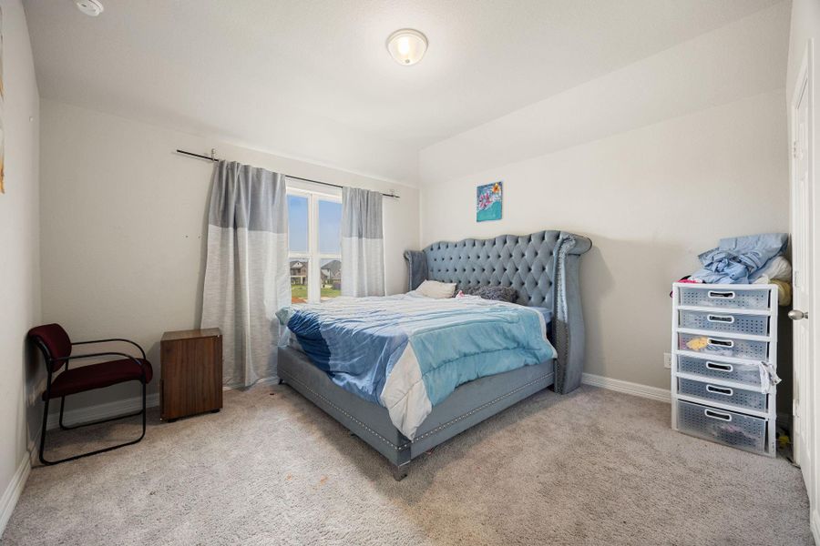 Furnished interior view inside a new home in Sunterra 60ft, Katy (Image 25).