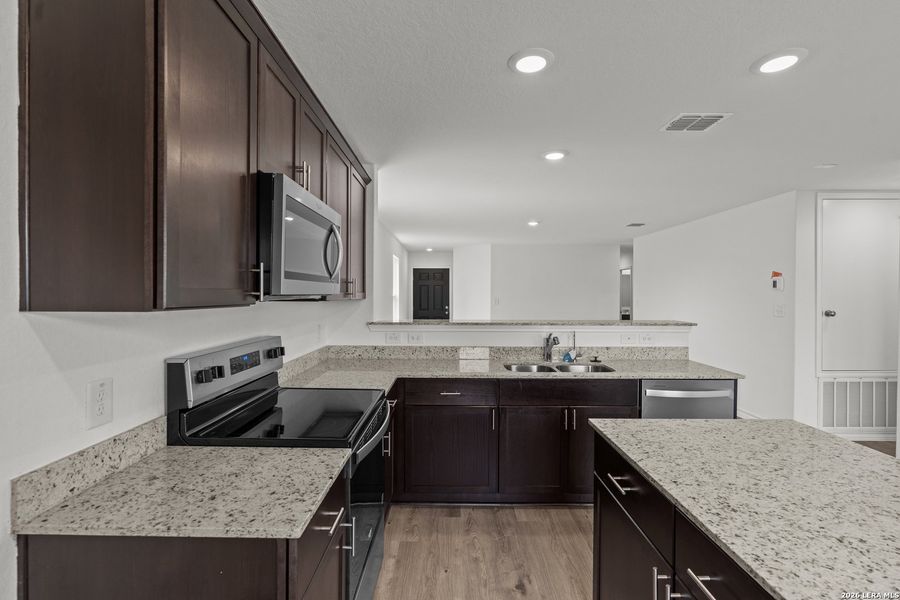 Furnished interior view inside a new home in Dove Song, Marion (Image 9).