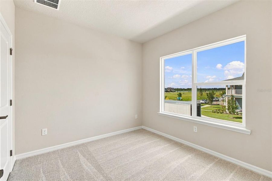 Spacious, unfurnished interior of a new home in Laureate Park at Lake Nona - Garden Series, Orlando (Image 18).