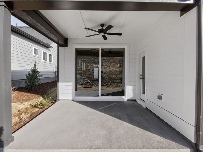 Exterior details and patio area of a home in Encore at Chatham Park – Villa Series, Pittsboro (Image 4). Exterior details and patio area of a home in Encore at Chatham Park – Villa Series, Pittsboro (Image 4).