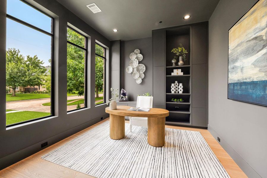 [STUDY/HOME OFFICE] A dramatic study/home office makes a bold statement with its rich designer palette, custom built-ins, and expansive windows that flood the space with natural light. Generous proportions provide ample room for work, study, or a executive office.
