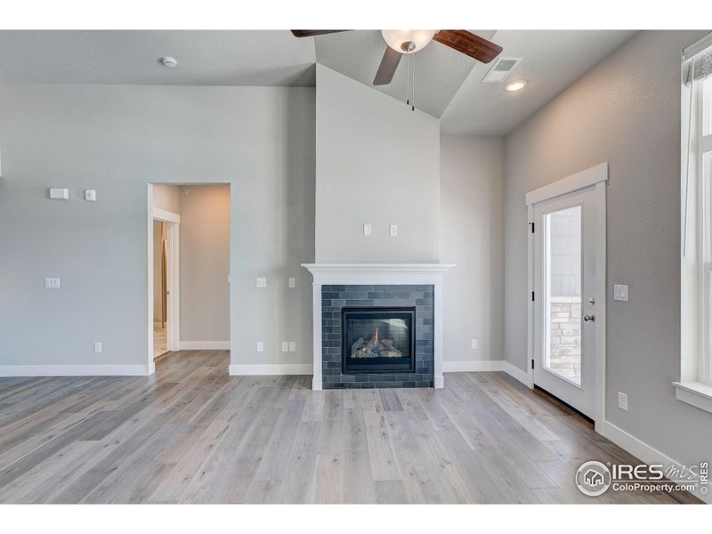 Living Room with Gas Fireplace-  Photos not of the actual unit. Finishes vary.