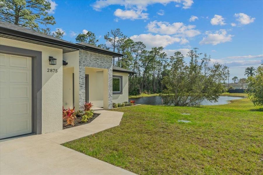 Exterior details and patio area of a home in , Deltona (Image 24).