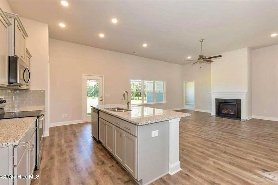 Furnished interior view inside a new home in Windfield, Grimesland (Image 5).