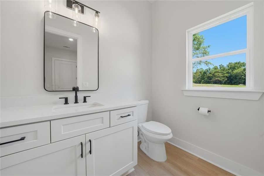 Furnished interior view inside a new home in , White (Image 8).