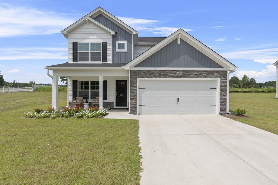 Front exterior of a new home in Harmon Hill Estates, Hopkins, SC, highlighting curb appeal (Image 2).